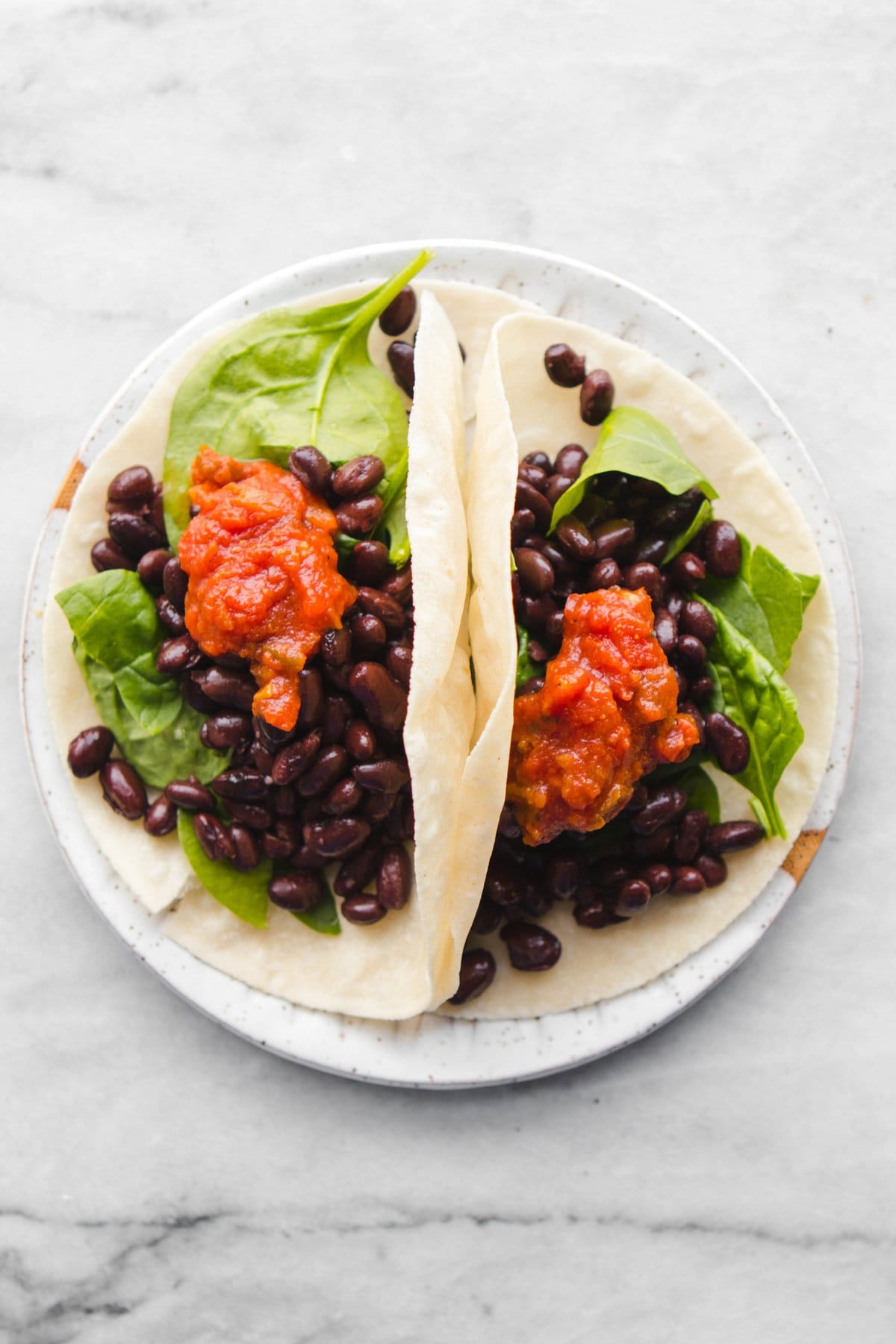 black bean tacos with salsa and spinach
