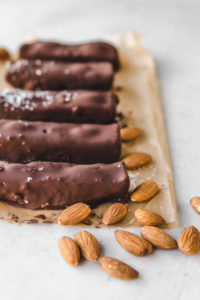 side shot of almond joy bars with almonds