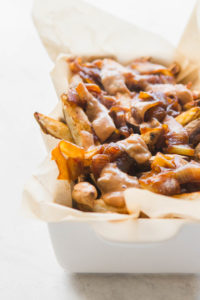 Vegan Animal Style Fries with Special Sauce in white container
