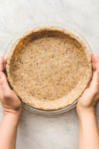3 Ingredient Pie Crust that is healthy, vegan, grain free, and oil free! Perfect for quiches, pies, and more. #vegan #plantbased #piecrust #healthypiecrust #oilfree #dessert #quiche #glutenfree via frommybowl.com