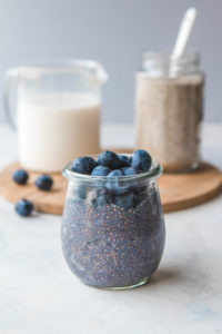 jar of blueberry chia seed pudding with blueberries