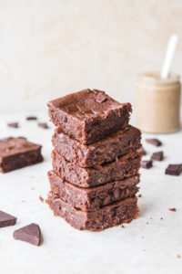 stack of brownies with chocolate and almond butter