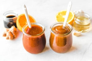 orange sauce variations in glass jars