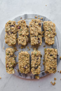 No bake granola bars lined up on cutting board
