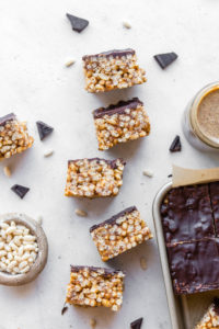 healthy rice crispy treats with chocolate on white background