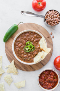 refried beans on white background with recipe ingredients