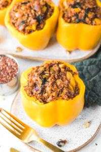 stuffed yellow pepper with gold fork