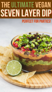 This Vegan Seven Layer Dip is made of layers of Refried Beans, Guacamole, Queso, and more...making it a perfect appetizer or party treat! Gluten Free & Oil Free #vegan #plantbased #dip #partydip #healthyappetizer #appetizer #sevenlayerdip #refriedbeans #guacamole #glutenfree #gameday #potluck via frommybowl.com