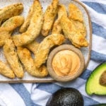 avocado fries on white tray with chipotle mayo