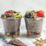 2 glass jars of blended and unblended acai chia pudding