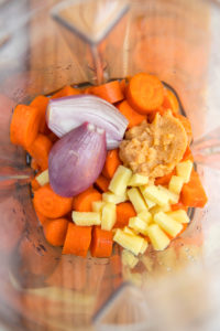 ingredients for carrot ginger dressing in high speed blender