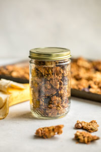 easy vegan granola in sealed glass mason jar with gold lid