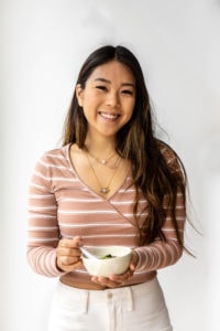 remy smiling holding bowl of miso soup