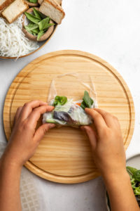 hand folding bottom of rice paper roll