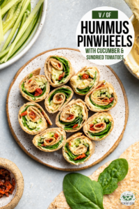 These Easy Hummus Pinwheels are stuffed with spinach, cucumber, and sun-dried tomatoes for a hearty, healthy, filling, and plant-based appetizer or lunch! #pinwheels #hummus #veganlunch #glutenfree #plantbased | frommybowl.com
