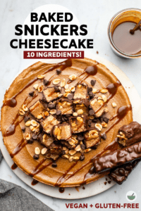 This Baked Snickers Cheesecake is totally vegan *and* totally delicious! All you need are 10 simple ingredients to make this creamy and decadent dessert. #snickers #cheesecake #vegan #glutenfree #snickerscheesecake | frommybowl.com