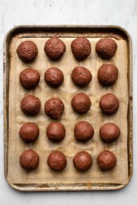 truffles arranged on baking sheet lined with parchment paper