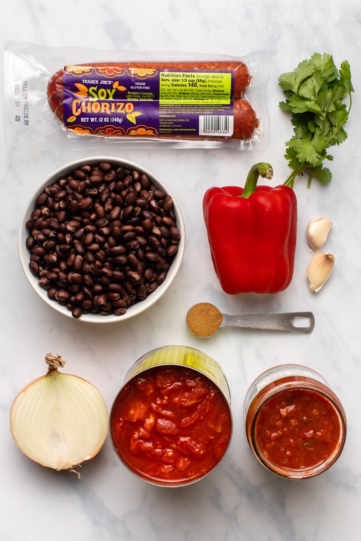 ingredients for vegan chorizo chili arranged on marble background