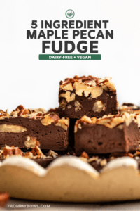 stack of maple pecan fudge on plate with scalloped edges