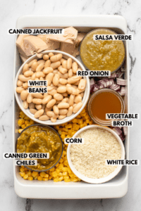 ingredients for salsa verde and white bean casserole in white ramekins