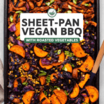 Roasted sweet potato, red cabbage, and corn tossed with bbq soy curls on dark baking tray