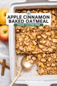 Vegan Apple Cinnamon Baked Oatmeal in white baking dish on marble countertop