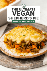 vegan shepherd's pie served on plate topped with parsley