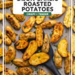 Roasted potatoes on baking sheet with spatula scooping them up