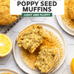lemon poppy seed muffin ripped in half on small white plate