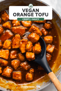 crispy orange tofu in pan with orange sauce