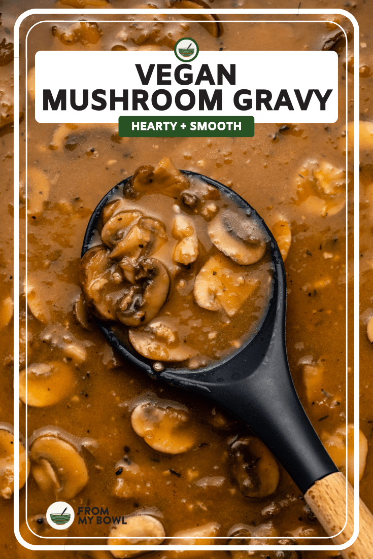 vegan mushroom gravy in large pan with serving spoon