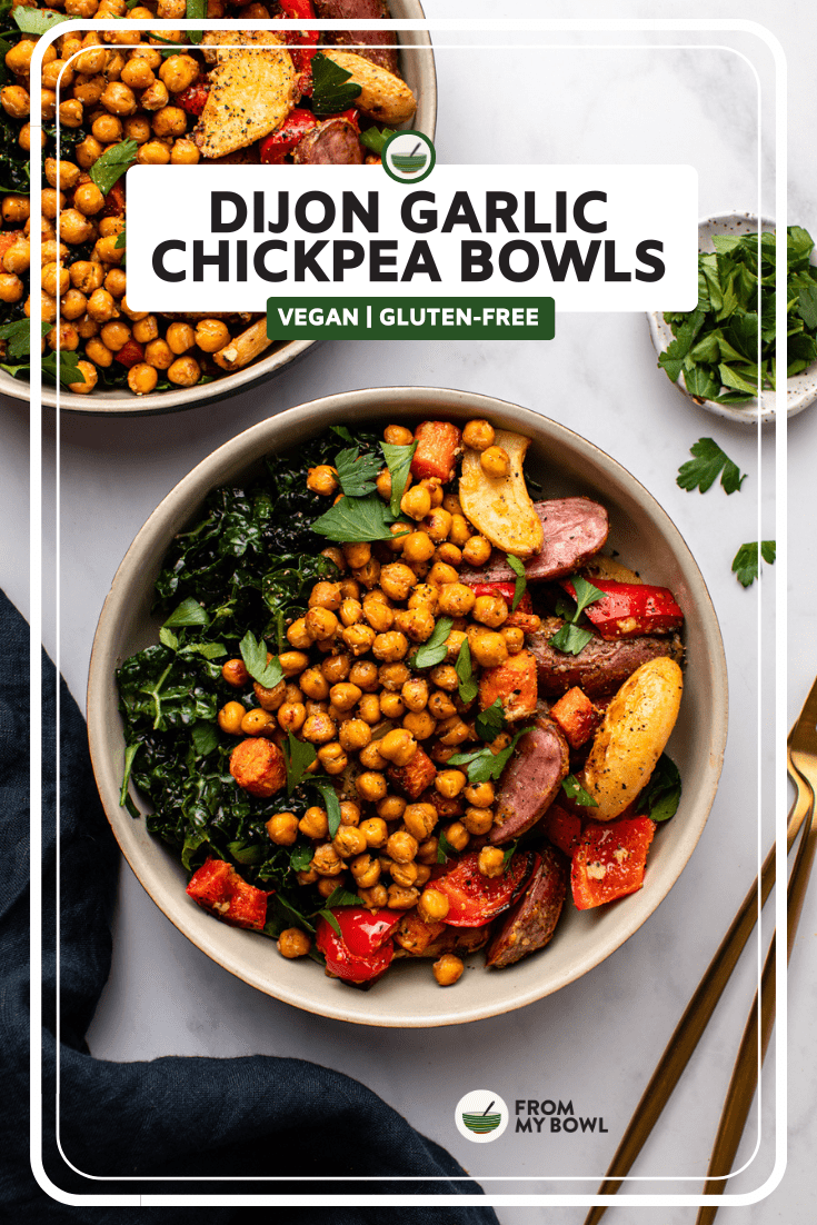 dijon garlic chickpeas served in a white bowl with greens on the side