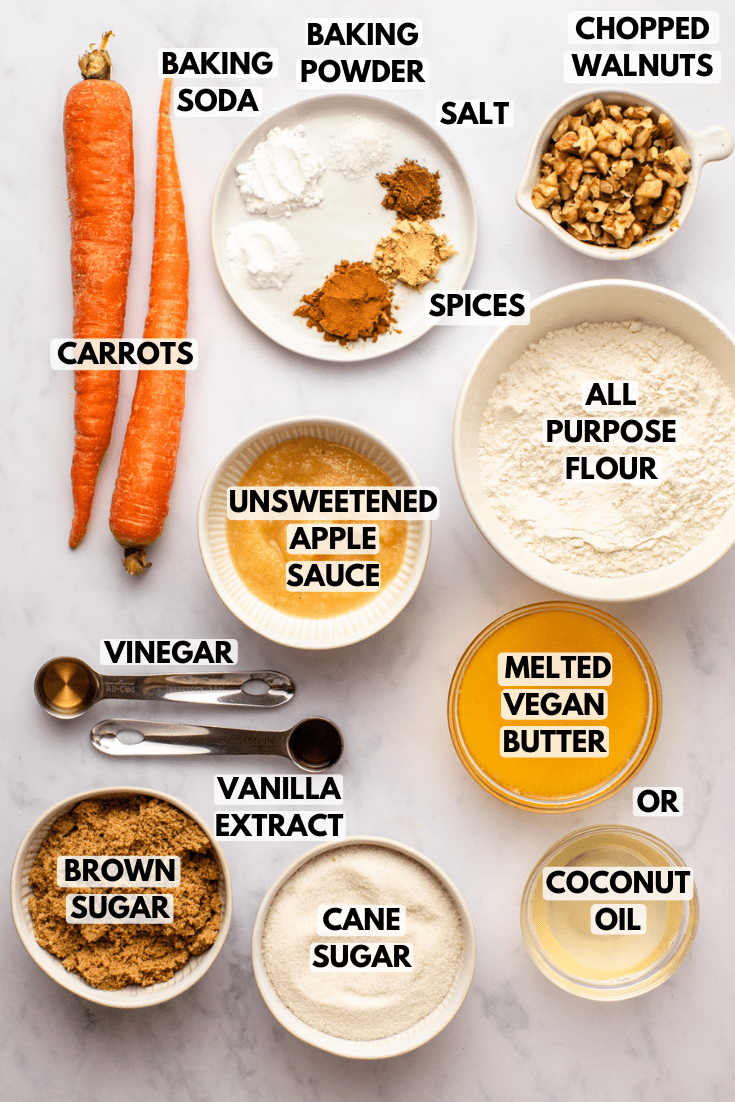 ingredients of the cake laid out on a marble kitchen countertop