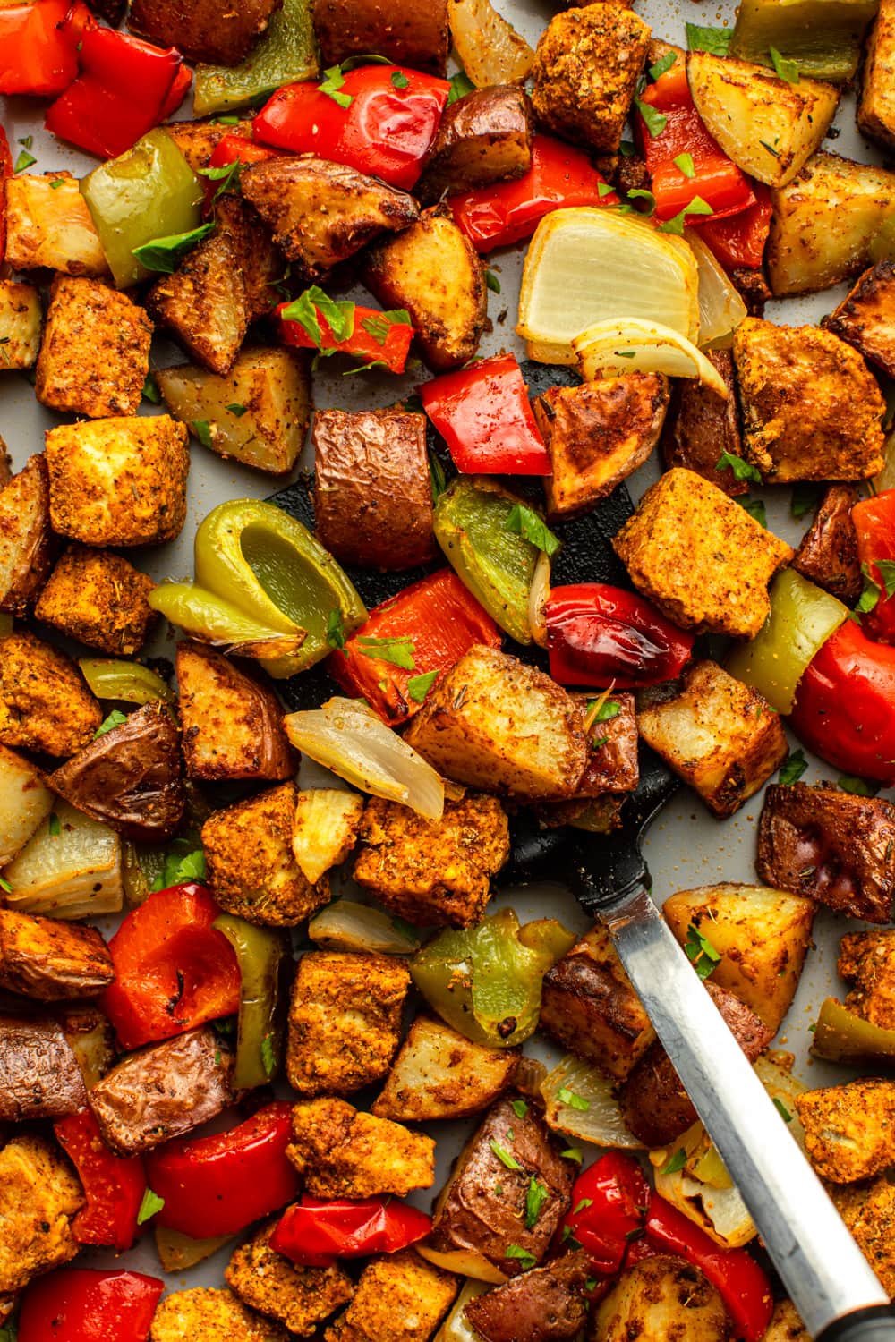 a zoomed in image of cajun tofu and veggies