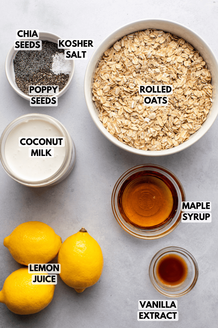 ingredients for lemon poppyseed overnight oats laid out on a marble kitchen countertop