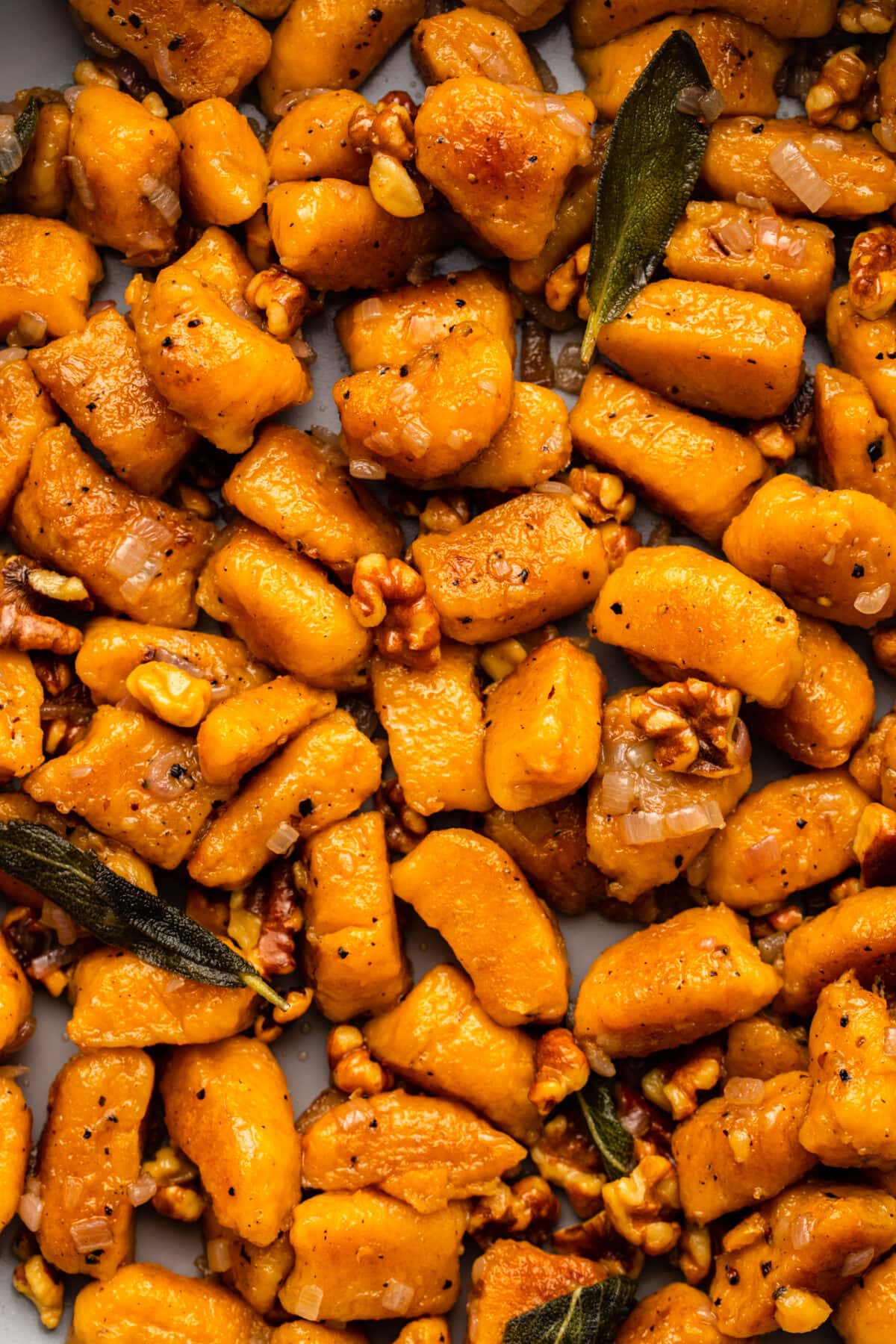 a zoomed in image of butternut squash gnocchi showing its texture
