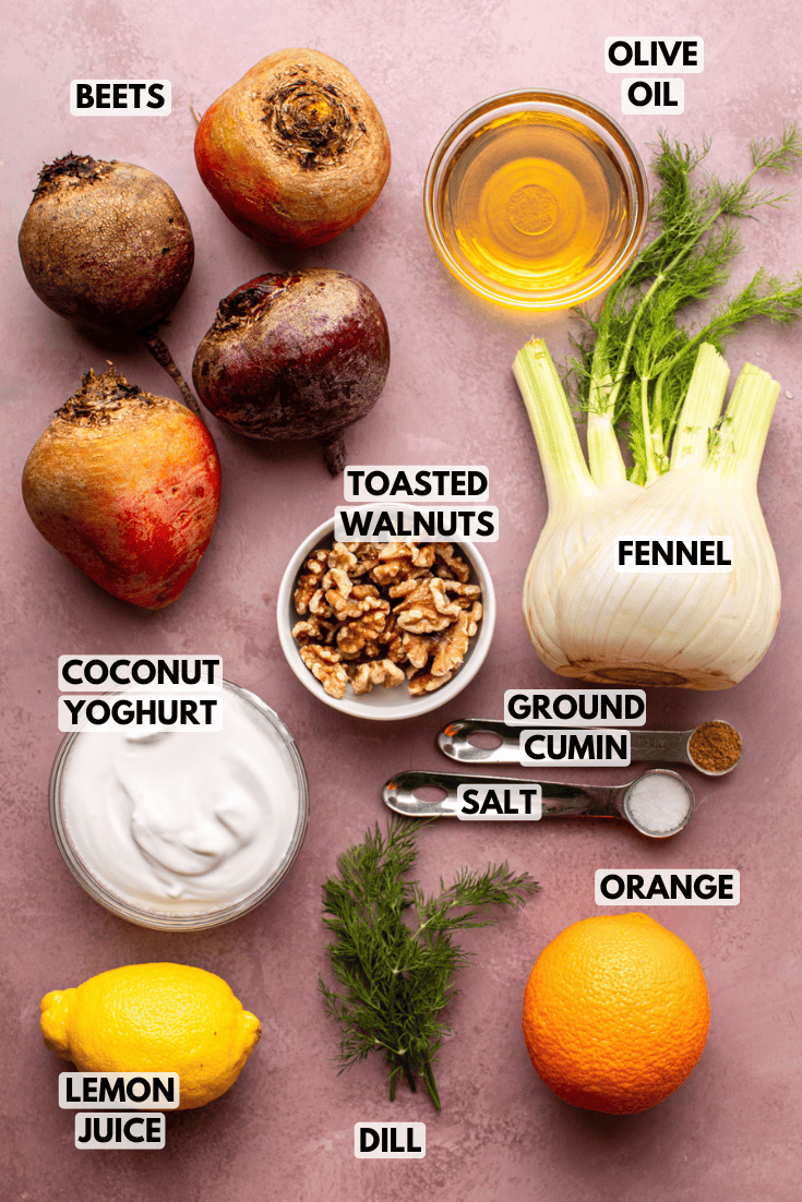 ingredients for roasted beet fennel salad laid out on a kitchen countertop
