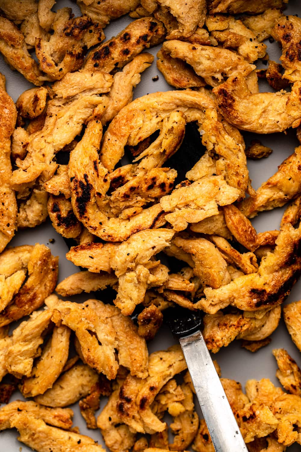 a zoomed in image of freshly cooked soy curls