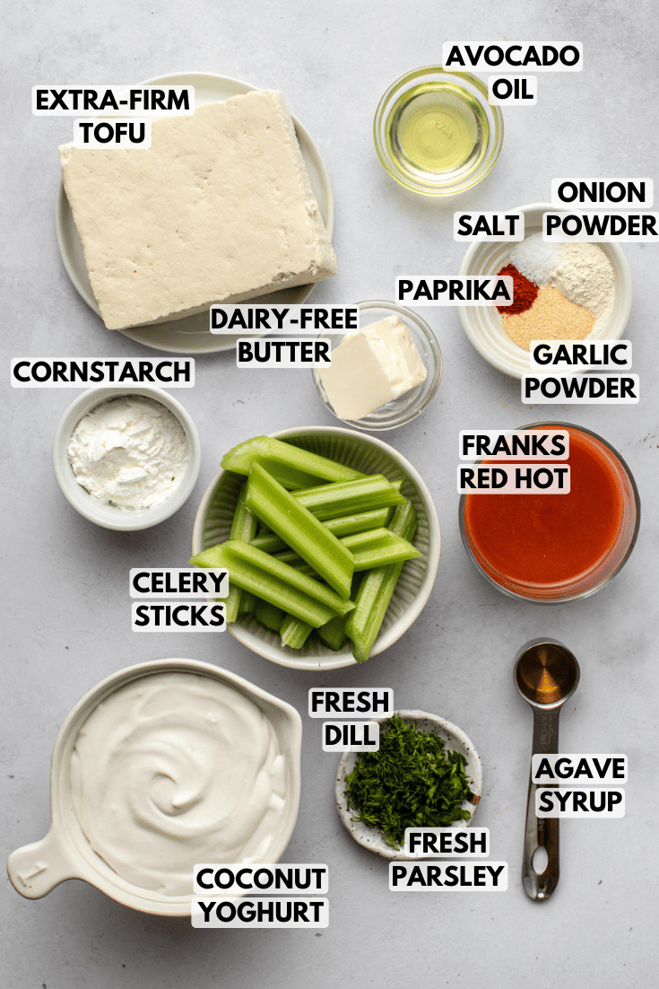 ingredients for buffalo tofu bites laid out on a marble kitchen countertop