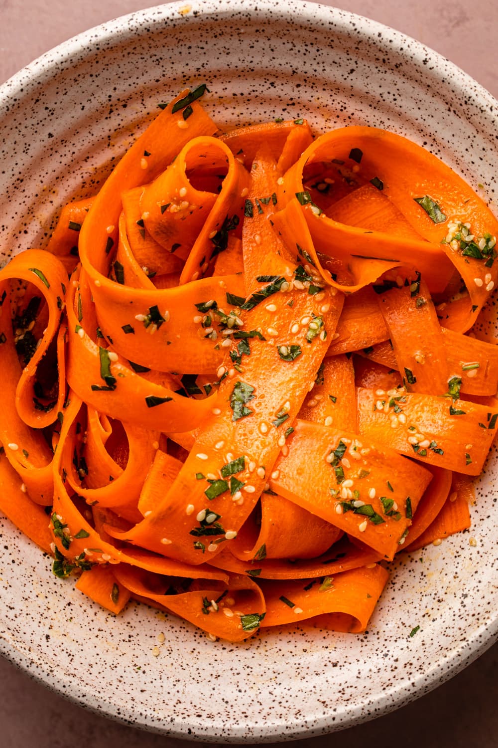 raw carrot salad served in a bowl