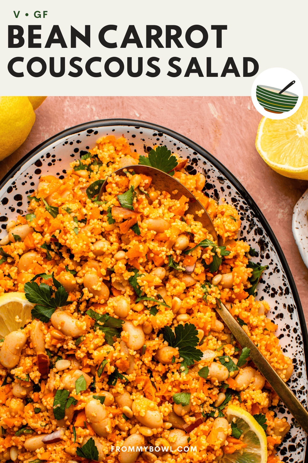 bean carrot couscous salad served on an oval plate topped with fresh parsley