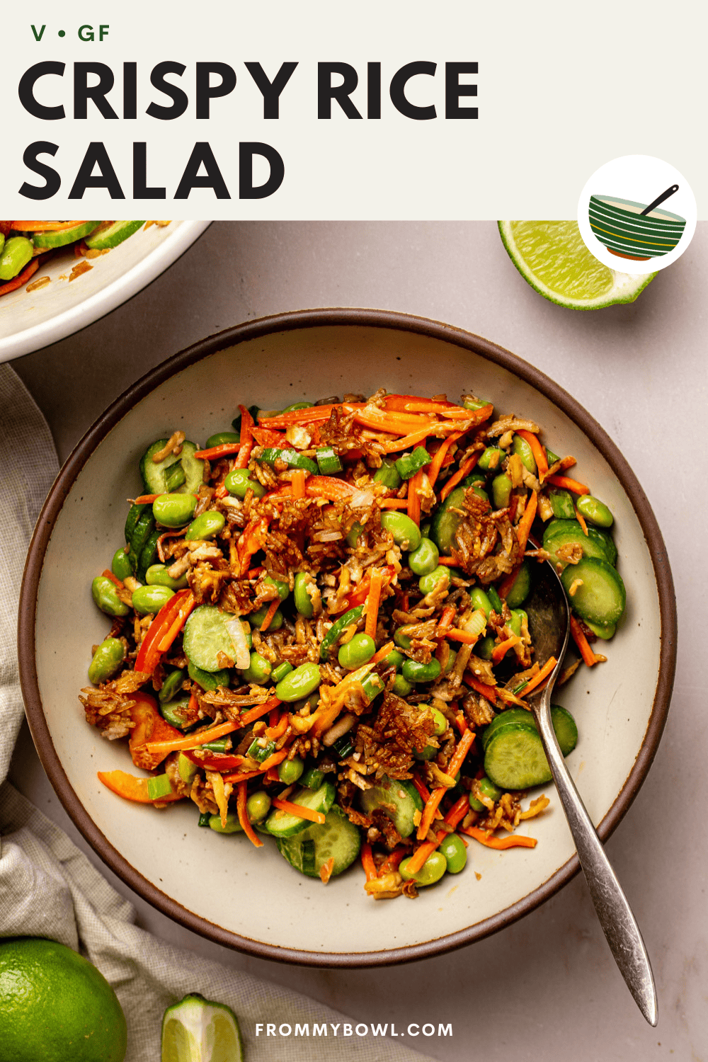 a large bowl of crispy rice salad filled with crunchy vegetables, edamame, and crispy rice coated in a flavorful dressing.